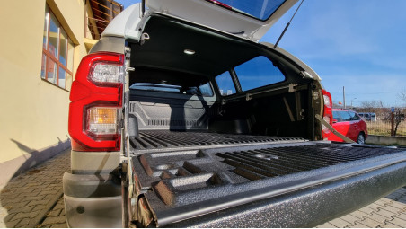 Canopy, hood guard, side steps, cross bars installed on Toyota Hilux 2020