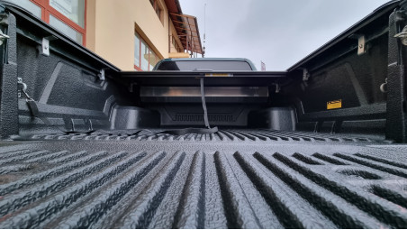 Roll cover, bed liner, bullbar, window visors, hood guard, spot lights installed on Hilux