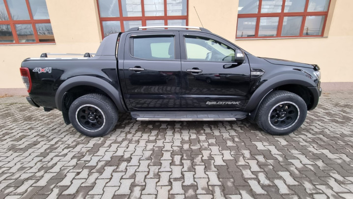 Roll cover, rollbar, cross bars, hood guard, window visors installed on Ranger 2018