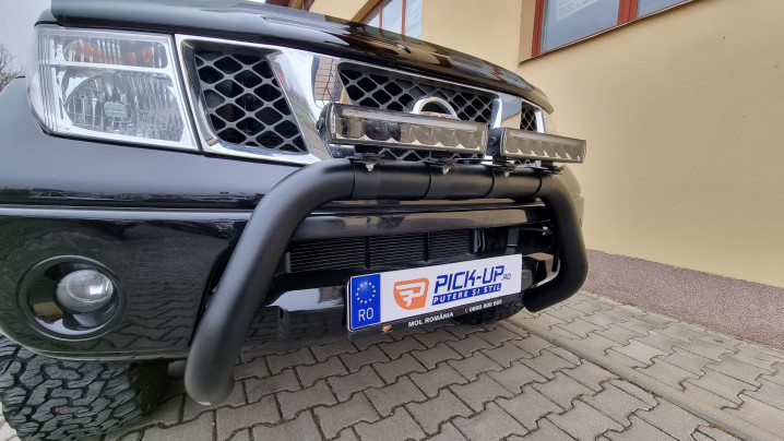 Montare inchidere bena tip capac, bullbar, reflectoare pe Nissan Navada D40