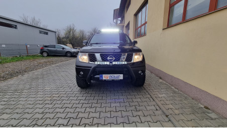 Fedő típusú motorháztető, bukócső, fényvisszaverők felszerelése Nissan Navada D40-re