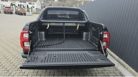 Bed liner, roll cover, bullbar, side steps, overfenders installed on Toyota Hilux 2023