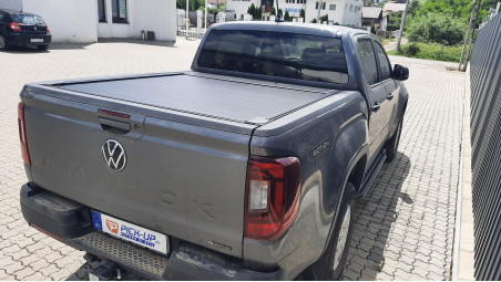 Roll Cover, bed liner, side steps installed on Volkswagen Amarok 2024