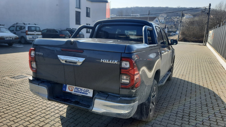 Tonneau cover with rollbar, bed liner installed on Toyota Hilux 2023