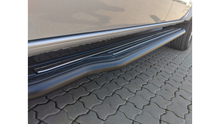 Roll Cover, bed liner, side steps installed on Volkswagen Amarok 2024