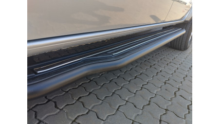 Roll Cover, bed liner, side steps installed on Volkswagen Amarok 2024