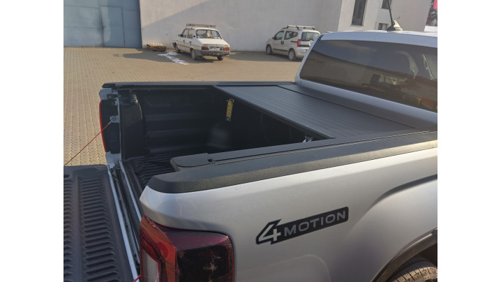 Roll Cover, bed liner, side steps installed on Volkswagen Amarok 2024