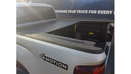 Roll Cover, bed liner, side steps installed on Volkswagen Amarok 2024