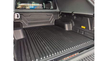 Canopy, bed liner, towing hook installed on Toyota Hilux 2024