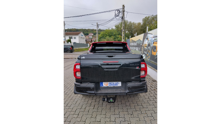 Montare închidere de benă tip capac și aundstență oblon pe Toyota Hilux GR Sport II