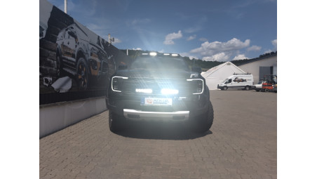 Montare reflectoare Triple‑R 850 Lazer Lamps si consolă proiectoare pe Ford Ranger Raptor 2025
