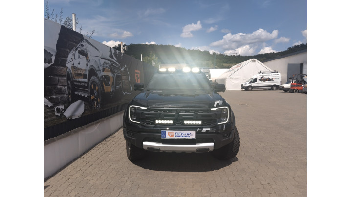 Montare reflectoare Triple‑R 850 Lazer Lamps si consolă proiectoare pe Ford Ranger Raptor 2025